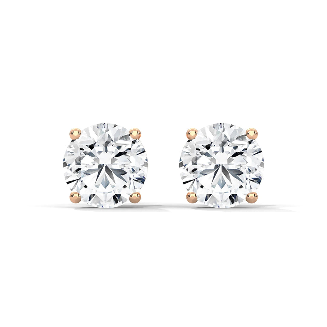 Elegant diamond stud earrings set in 18k rose gold showcasing a timeless design and exquisite craftsmanship.