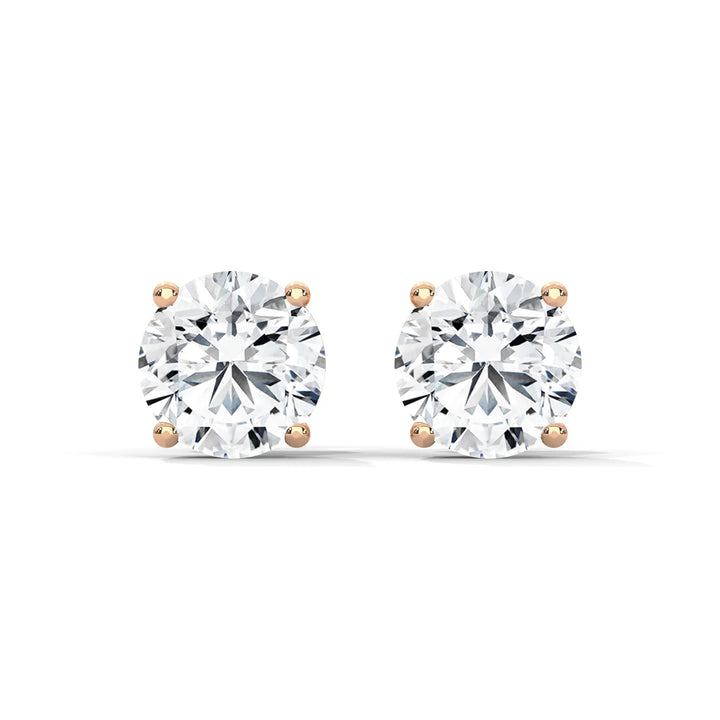 Elegant diamond stud earrings set in 18k rose gold showcasing a timeless design and exquisite craftsmanship.