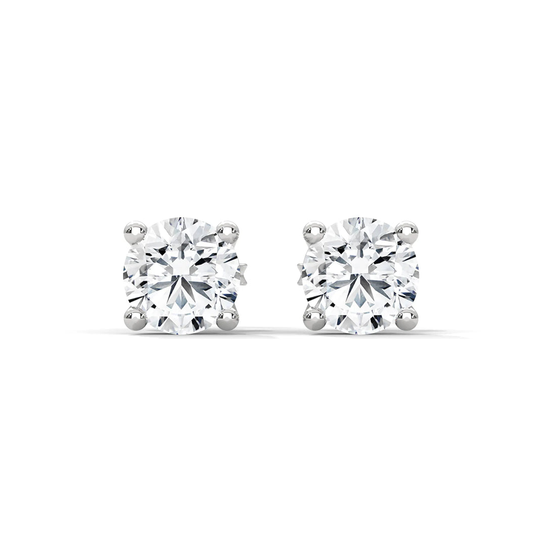 Elegant diamond stud earrings set in 18k white gold showcasing timeless beauty and sophistication.