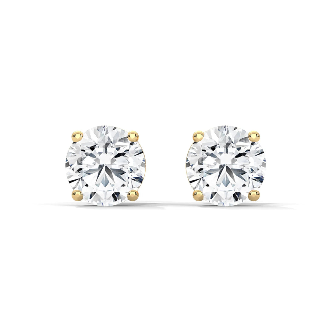 Elegant diamond stud earrings set in 18k yellow gold showcasing a timeless and luxurious design perfect for any occasion.