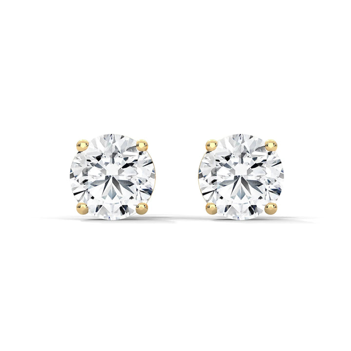 Elegant diamond stud earrings set in 18k yellow gold showcasing a timeless and luxurious design perfect for any occasion.