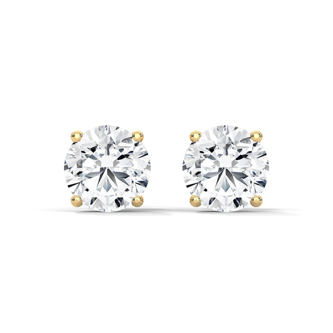 Elegant diamond stud earrings set in 18k yellow gold showcasing a timeless design and exquisite craftsmanship.