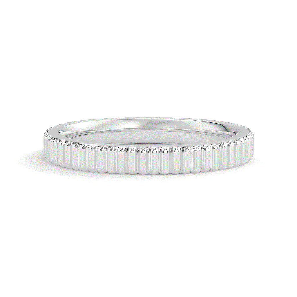 Elegant silver ring with a textured, grooved pattern encircling the band, set against a plain white background, exuding simplicity and sophistication.