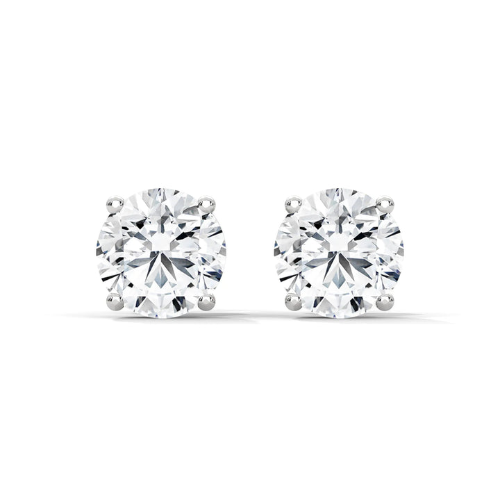 Elegant white gold diamond stud earrings showcasing a timeless design that enhances any jewelry collection.