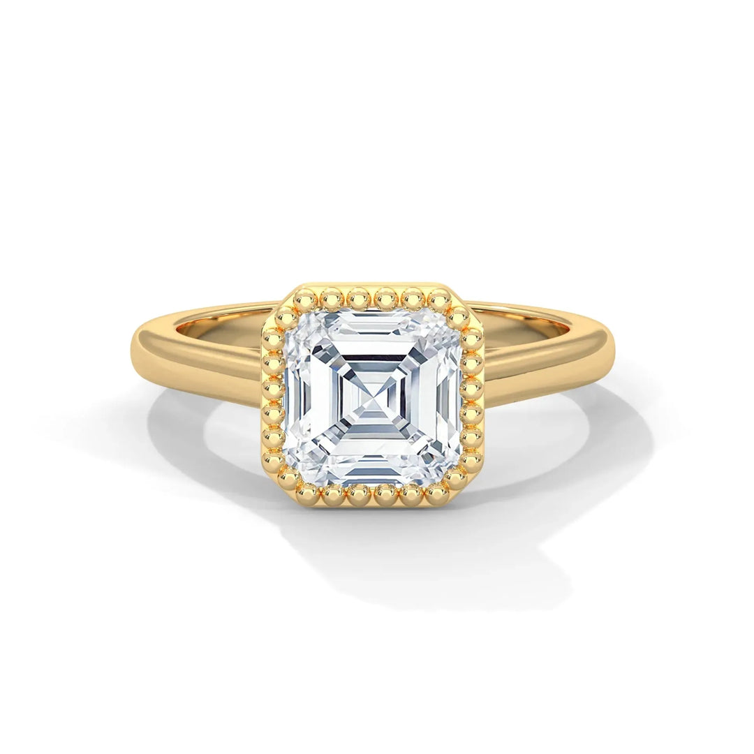 A gold-colored, bezel-set solitaire ring with small round diamonds around the center stone