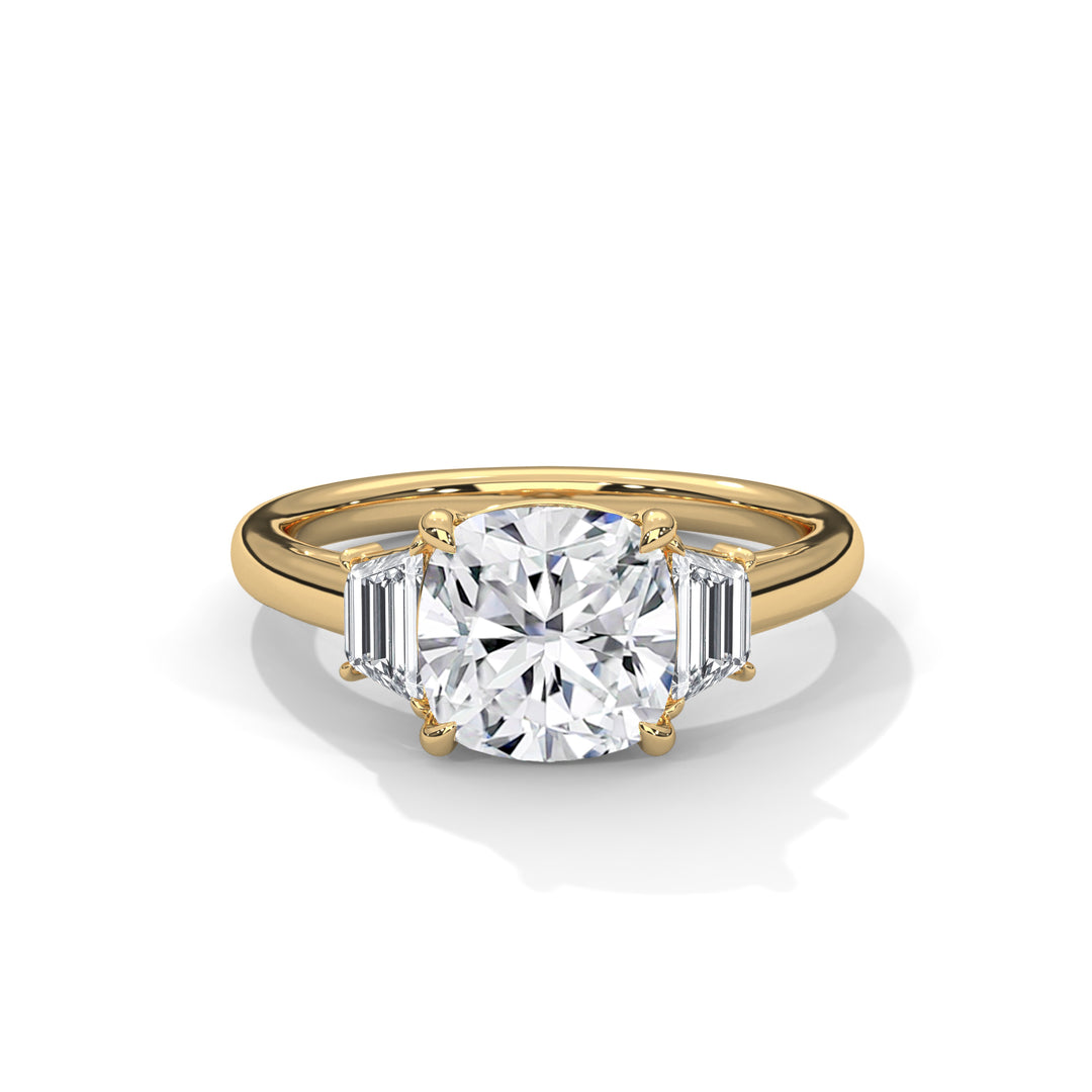 A gold engagement ring with a large round diamond centerpiece and two smaller baguette diamonds on each side, reflecting elegance and luxury.