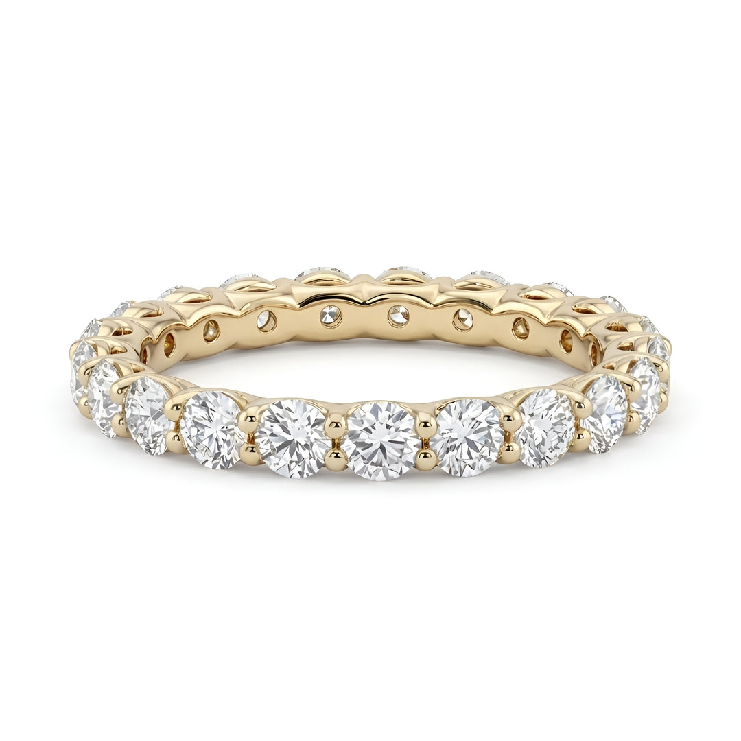Gold ring with diamonds on a white background