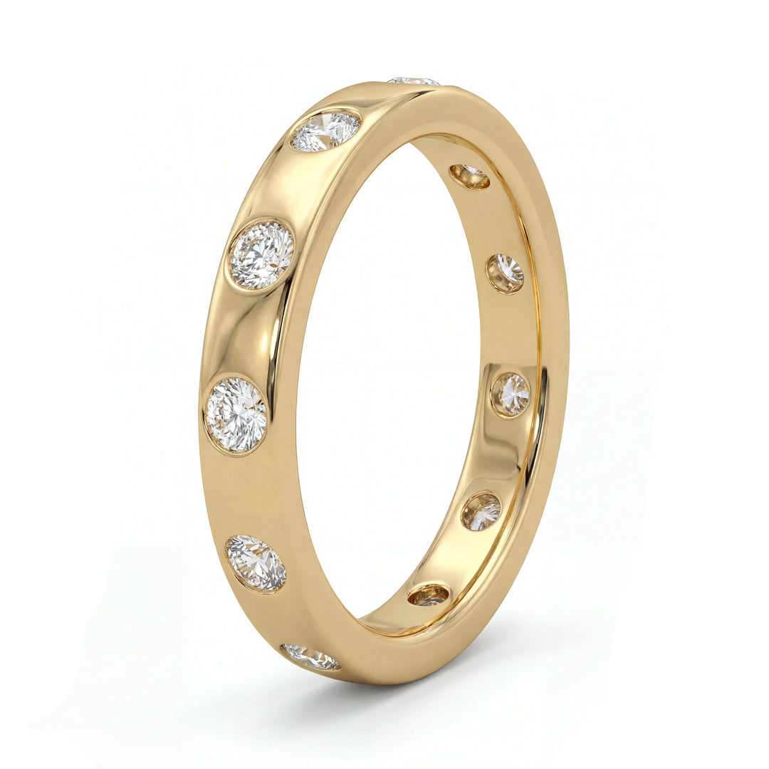 A gold ring with evenly spaced round diamonds set around the band, reflecting light. The ring exudes elegance and luxury against a plain background.