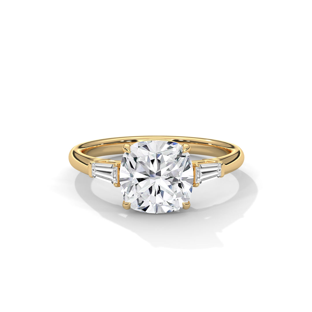 A gold ring featuring a large cushion-cut diamond centerpiece flanked by two baguette diamonds. The elegant design conveys luxury and sophistication.