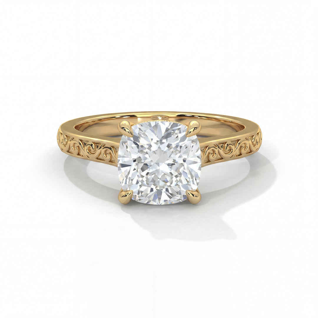 Gold ring with an intricate band design, showcasing a large, sparkling cushion-cut diamond at the center, exuding elegance and luxury.
