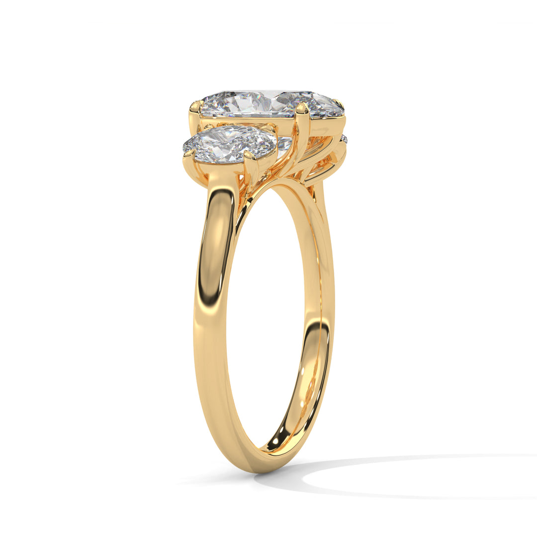 A gold ring with an oval-cut diamond, set in a prong setting, shines brilliantly. The elegant design conveys luxury and sophistication.