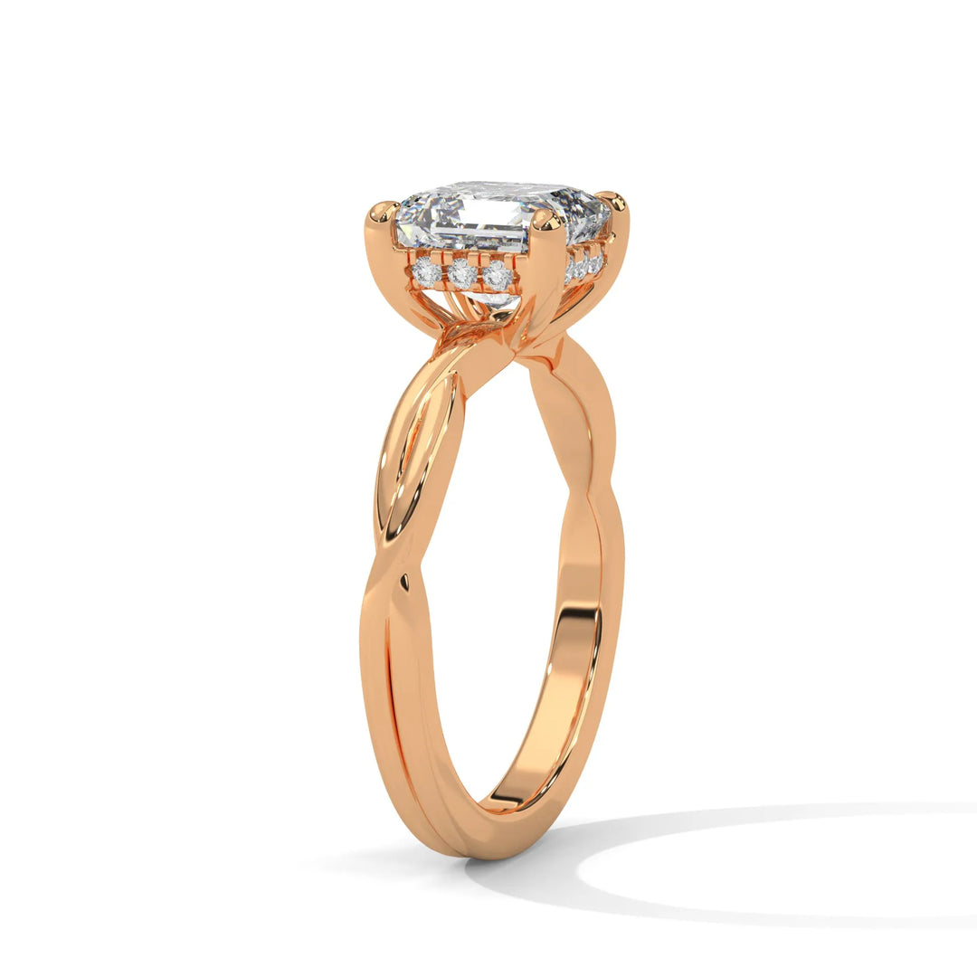 A rose gold engagement ring adorned with a asscher cut diamond center, exemplifying the refined Kosina setting craftsmanship.