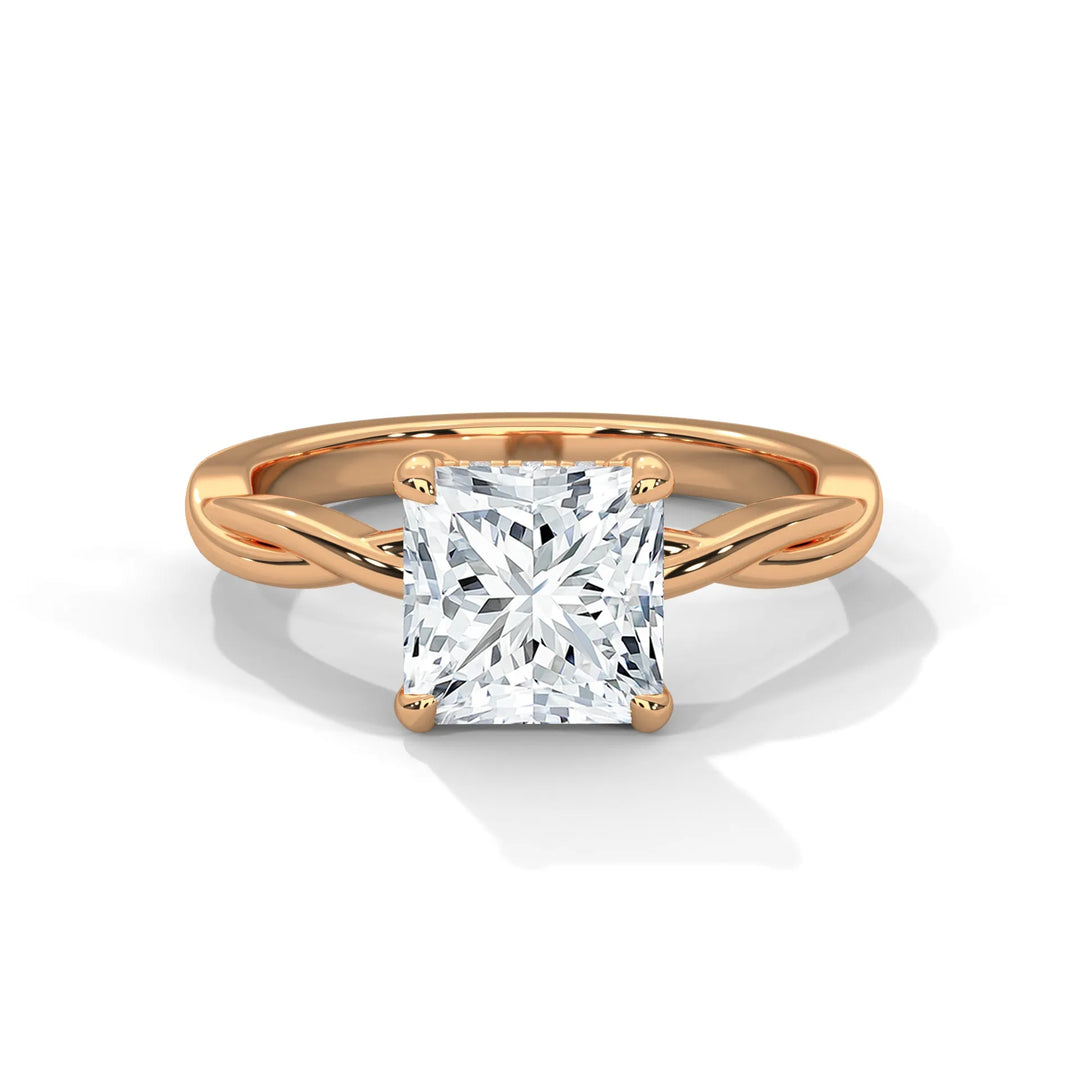 A stunning 14k rose gold engagement ring with a princess cut diamond, beautifully crafted in the Kosina setting.