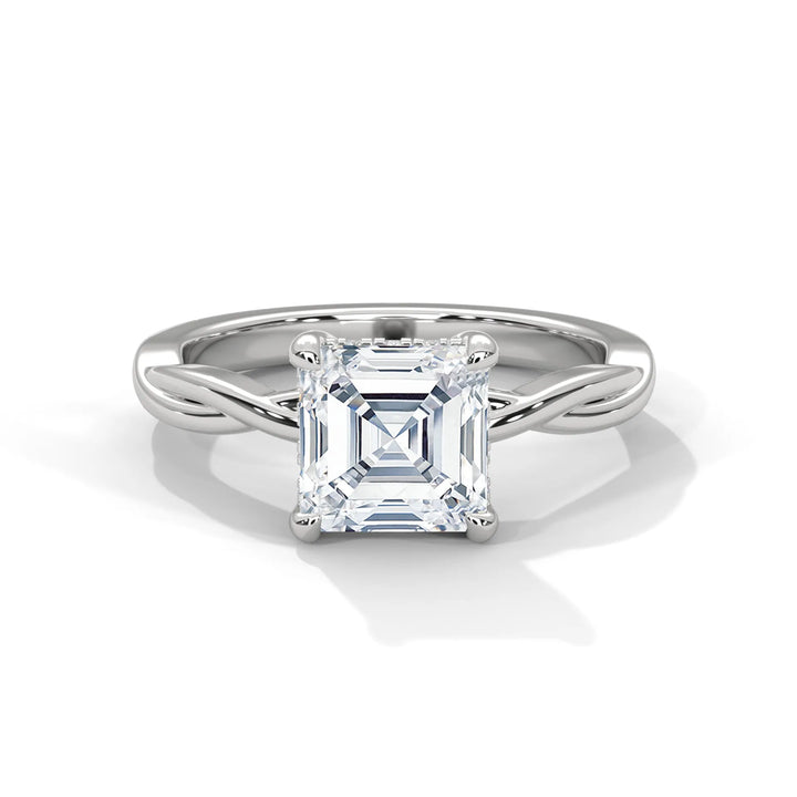 A stunning 14k white gold engagement ring with a asscher cut diamond, beautifully crafted in the Kosina setting.