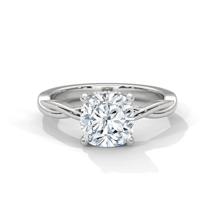 A stunning 14k white gold engagement ring with a cushion cut diamond, beautifully crafted in the Kosina setting.