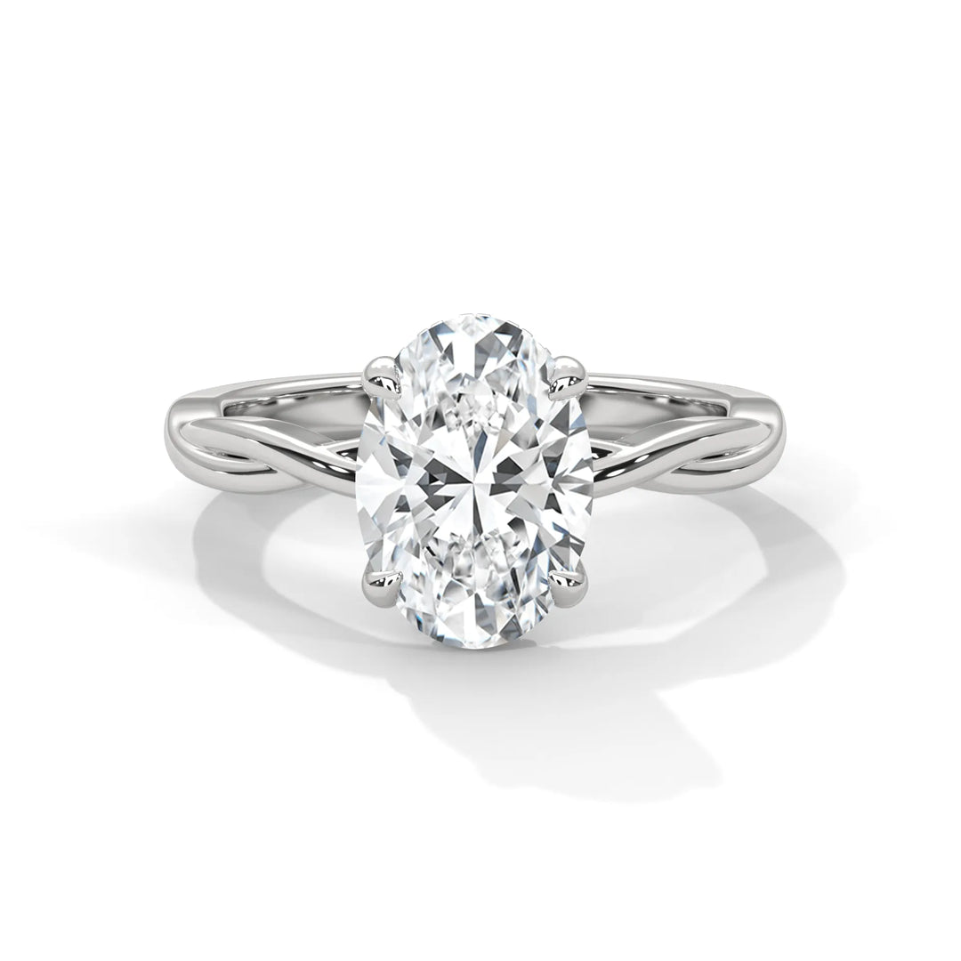 A stunning 14k white gold engagement ring with a oval cut diamond, beautifully crafted in the Kosina setting.