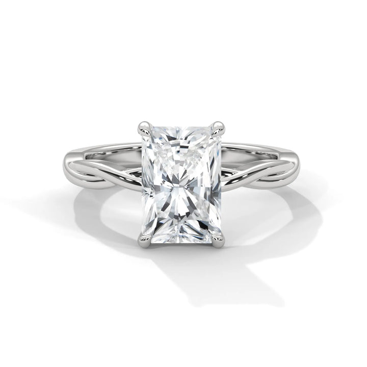 A stunning 14k white gold engagement ring with a radiant cut diamond, beautifully crafted in the Kosina setting.