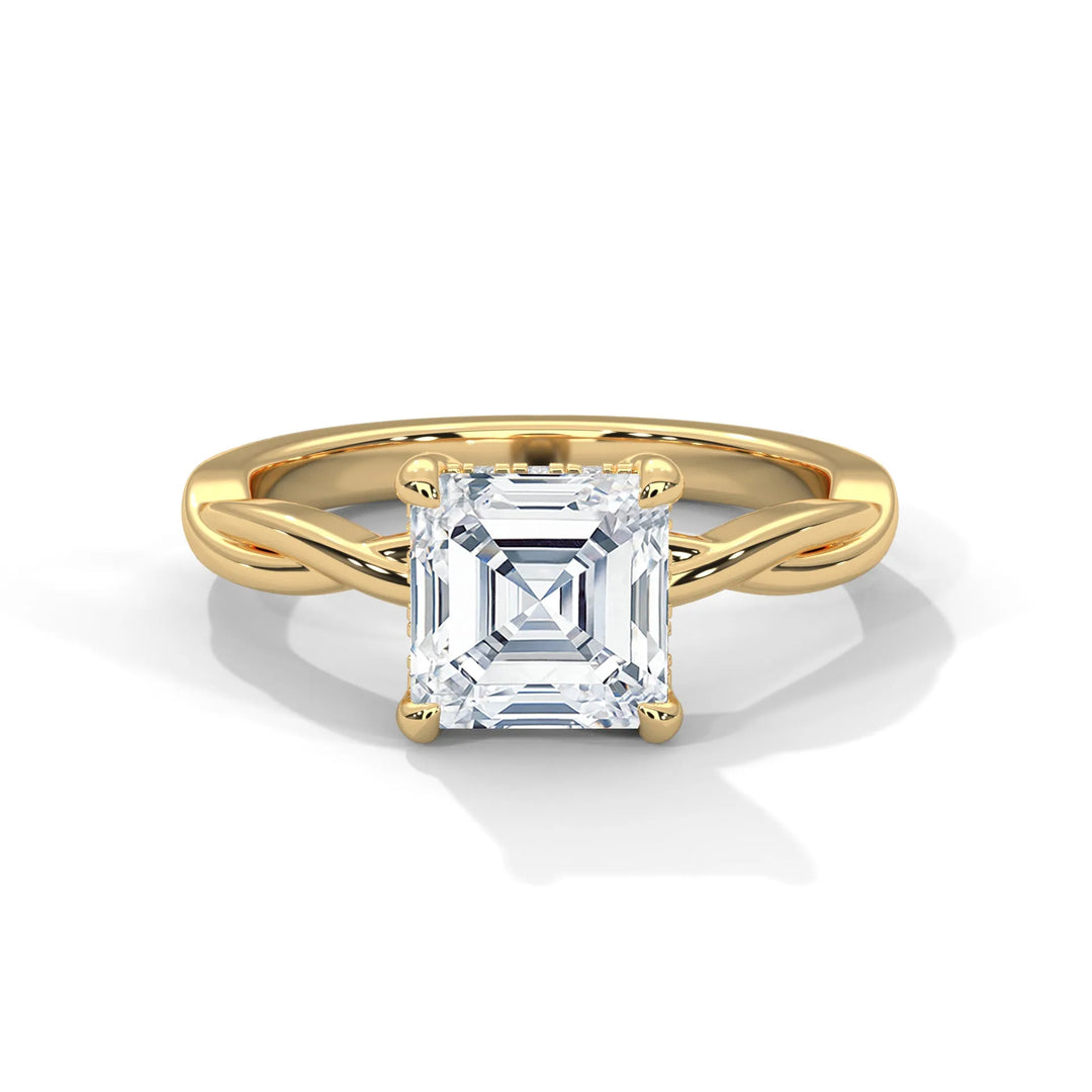 A stunning 14k yellow gold engagement ring with a asscher cut diamond, beautifully crafted in the Kosina setting.