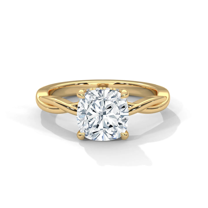 A stunning 14k yellow gold engagement ring with a cushion cut diamond, beautifully crafted in the Kosina setting.