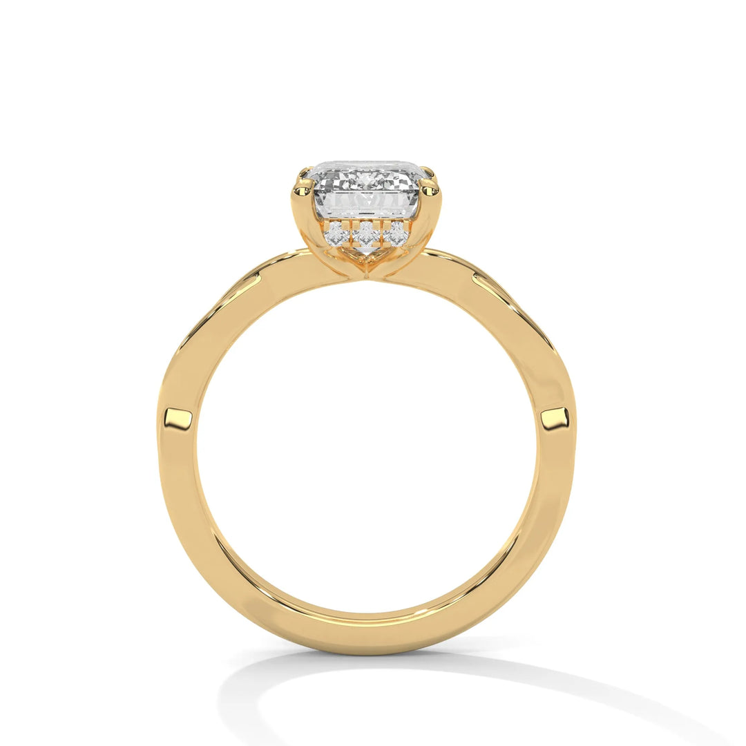 A yellow gold engagement ring adorned with a emerald cut diamond center, featuring the elegant Kosina setting for added charm.