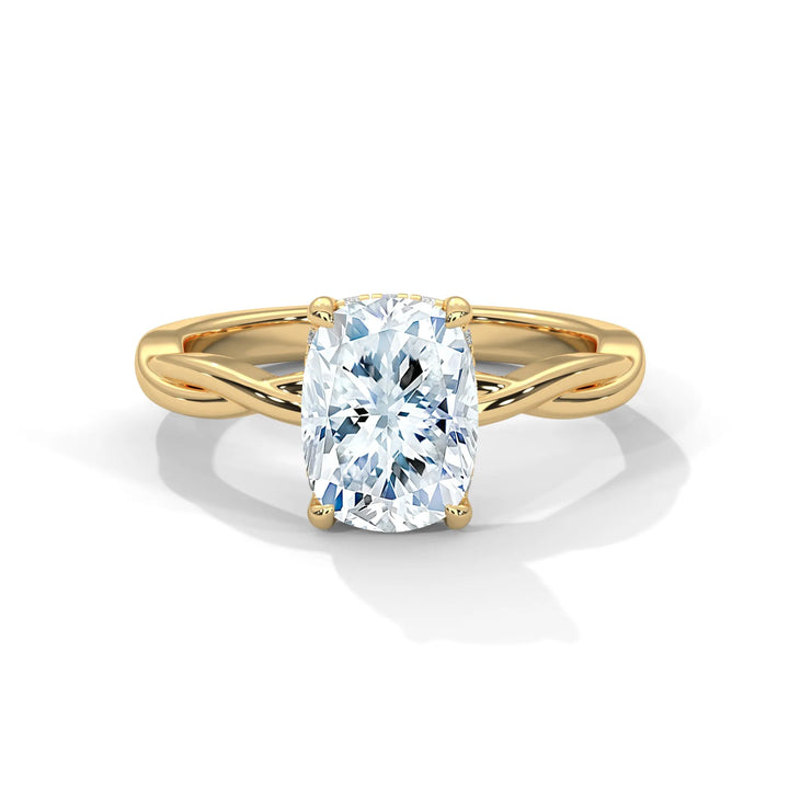 A stunning 14k yellow gold engagement ring with a long cushion cut diamond, beautifully crafted in the Kosina setting.