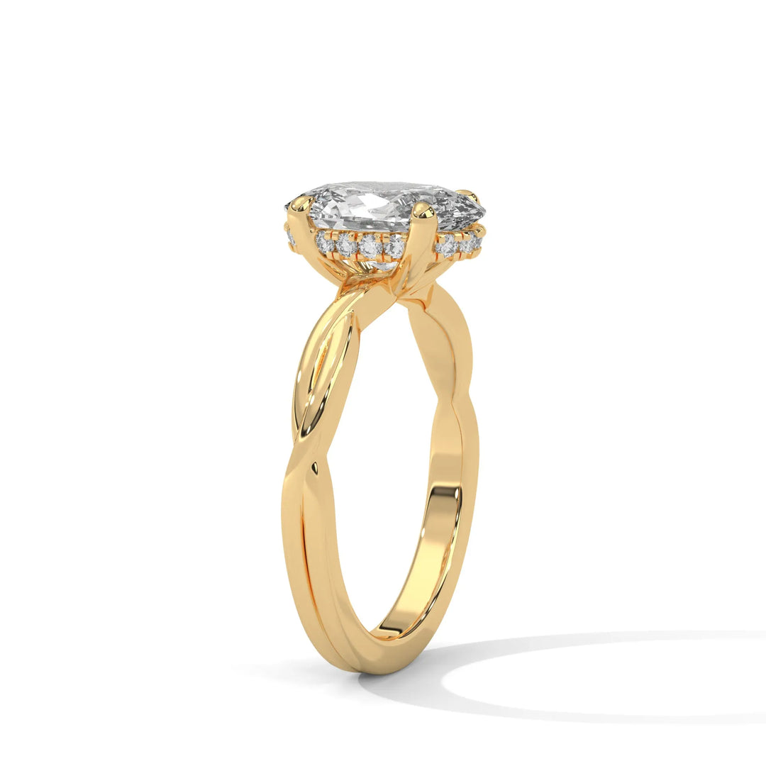 A yellow gold engagement ring adorned with a oval cut diamond center, exemplifying the refined Kosina setting craftsmanship.