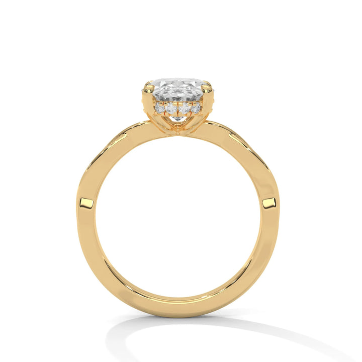 A yellow gold engagement ring adorned with a oval cut diamond center, featuring the elegant Kosina setting for added charm.