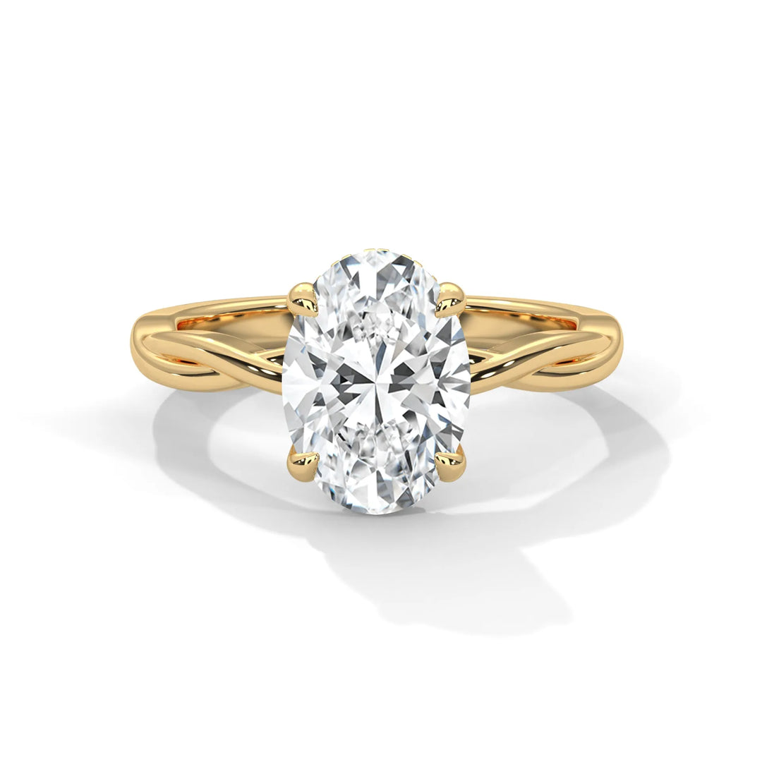 A stunning 14k yellow gold engagement ring with a oval cut diamond, beautifully crafted in the Kosina setting.