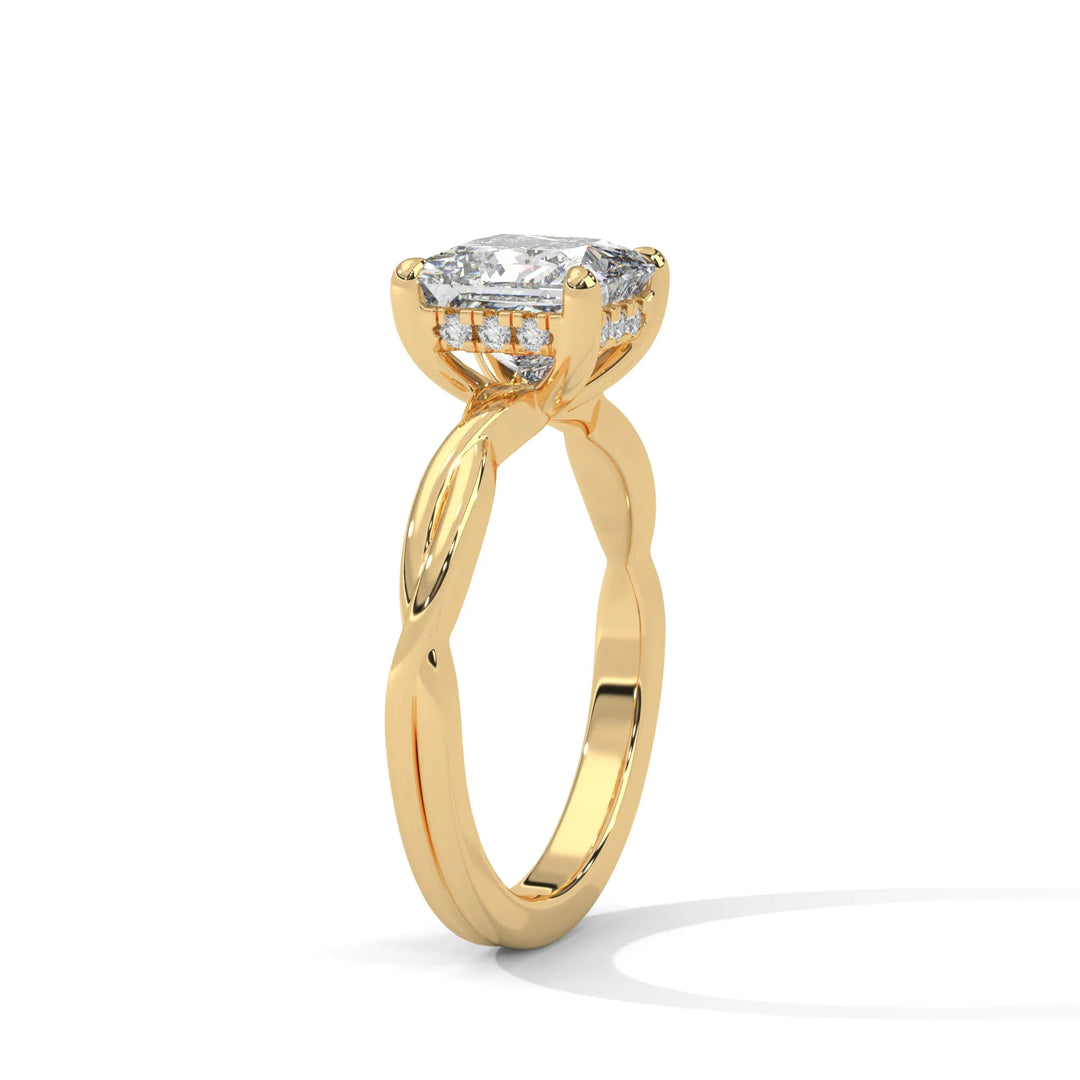 A yellow gold engagement ring adorned with a princess cut diamond center, exemplifying the refined Kosina setting craftsmanship.