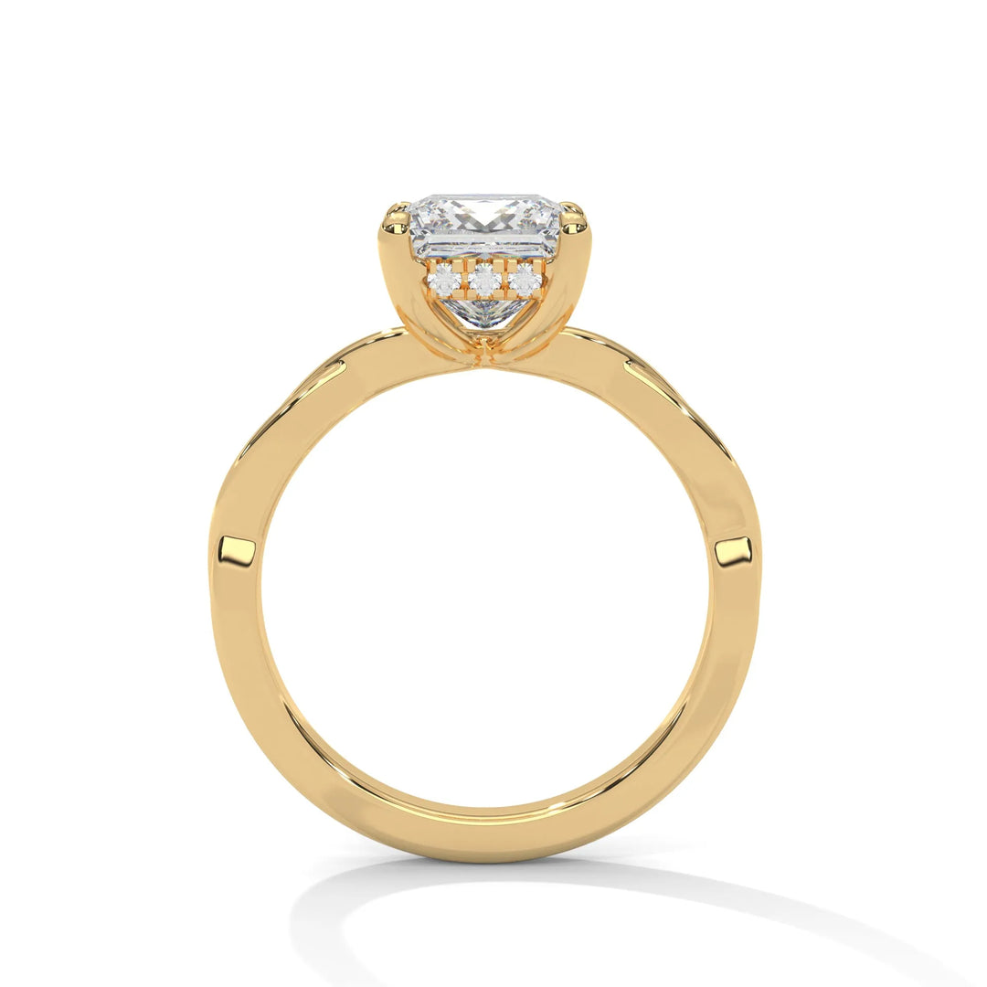 A yellow gold engagement ring adorned with a princess cut diamond center, featuring the elegant Kosina setting for added charm.