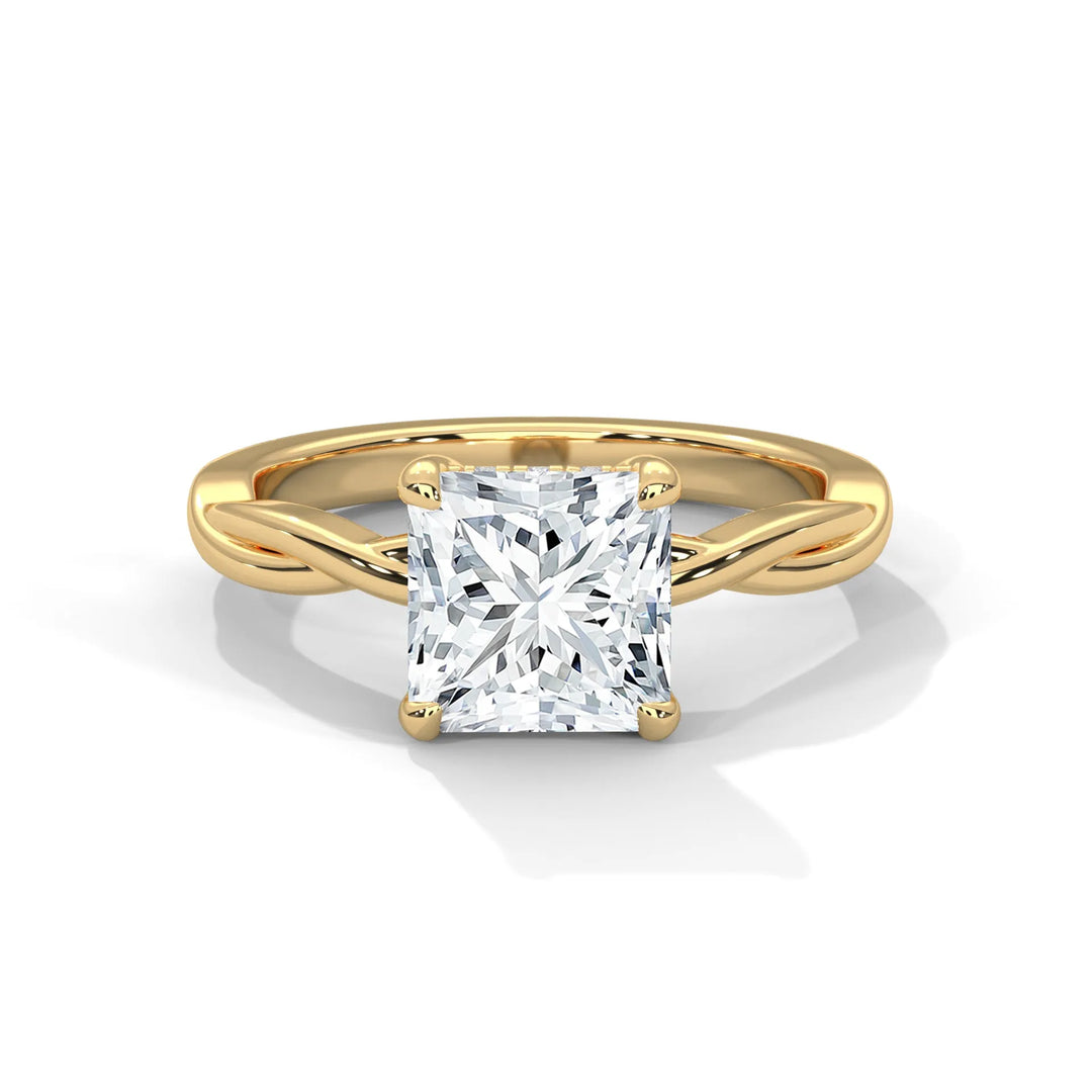 A stunning 14k yellow gold engagement ring with a princess cut diamond, beautifully crafted in the Kosina setting.