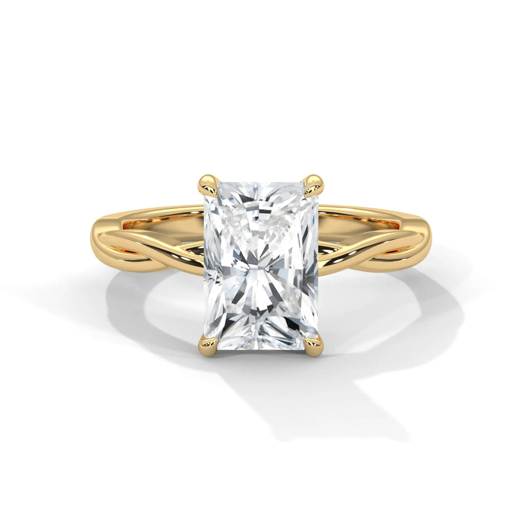 A stunning 14k yellow gold engagement ring with a radiant cut diamond, beautifully crafted in the Kosina setting.