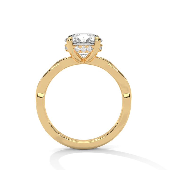 A yellow gold engagement ring adorned with a round cut diamond center, featuring the elegant Kosina setting for added charm.