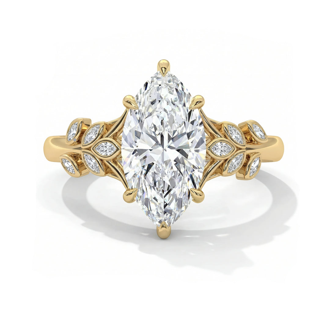 Marquise cut diamond engagement ring in 14k yellow gold with nature inspired floral leaf setting and pave diamond accents