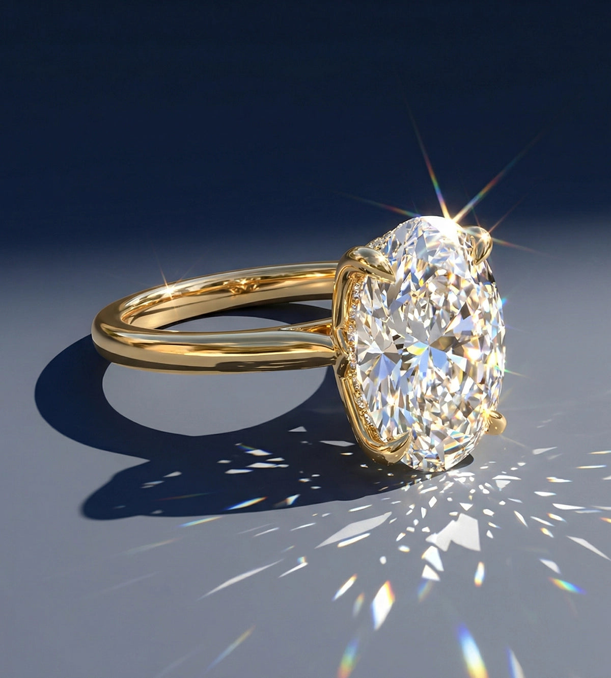 Close-up of a luxurious oval-cut diamond engagement ring set in polished yellow gold featuring pave-set diamond details on the prongs, displaying brilliant light reflections and sparkles against a dark background.