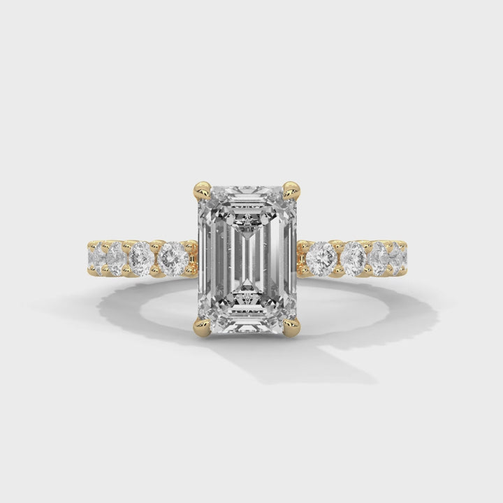 Close-up video showcasing The Bubble Setting 14k yellow gold yellow gold diamond ring, highlighting its intricate bubble-inspired design, sparkling diamonds, and contemporary elegance from multiple angles.