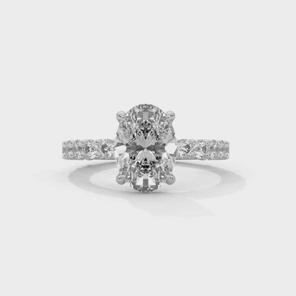 Close-up video showcasing The Bubble Setting 14k white gold white gold diamond ring, highlighting its intricate bubble-inspired design, sparkling diamonds, and contemporary elegance from multiple angles.