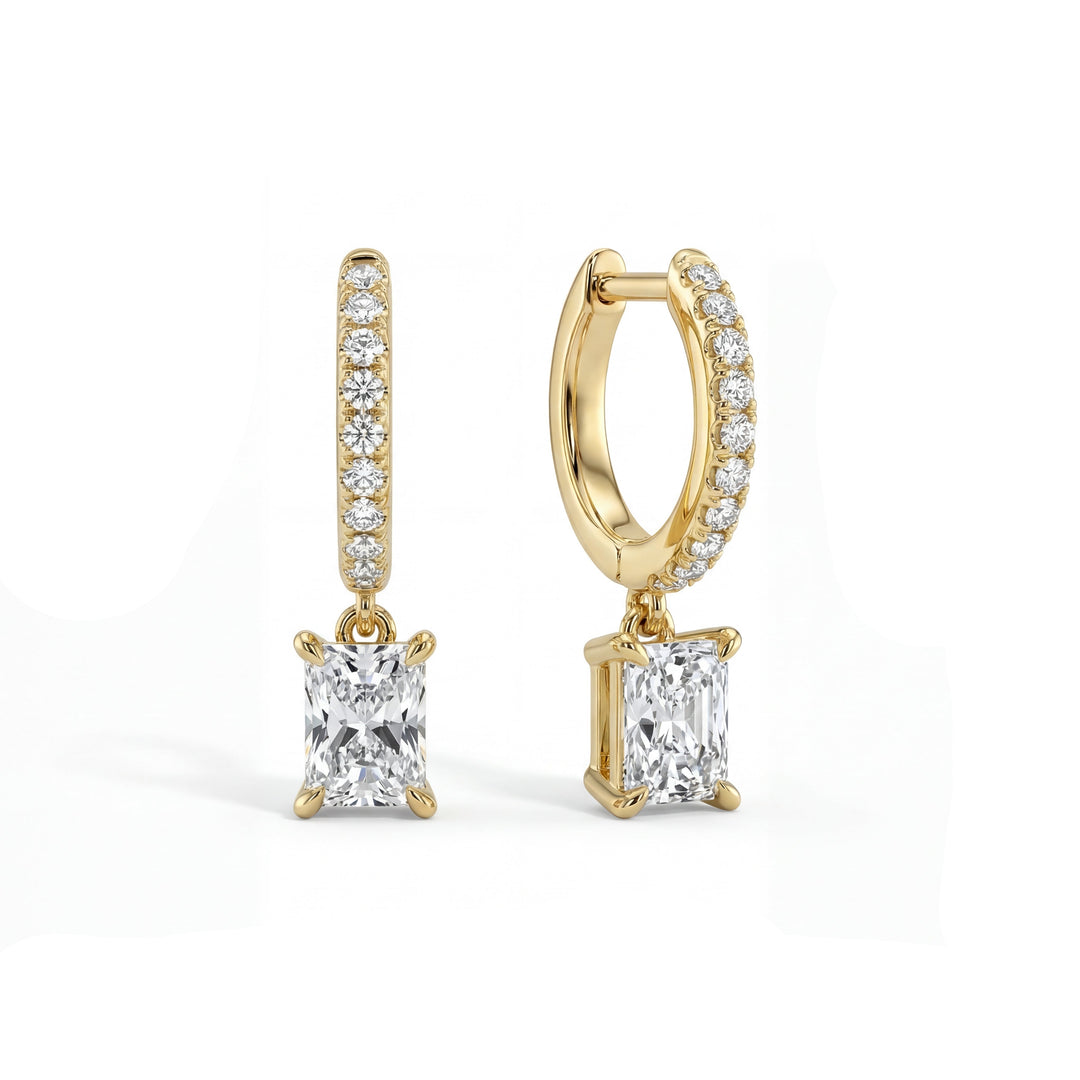 Radiant Pave Hoop Earrings in gold with baguette cut diamond drops. Elegant and stylish hoop earrings.