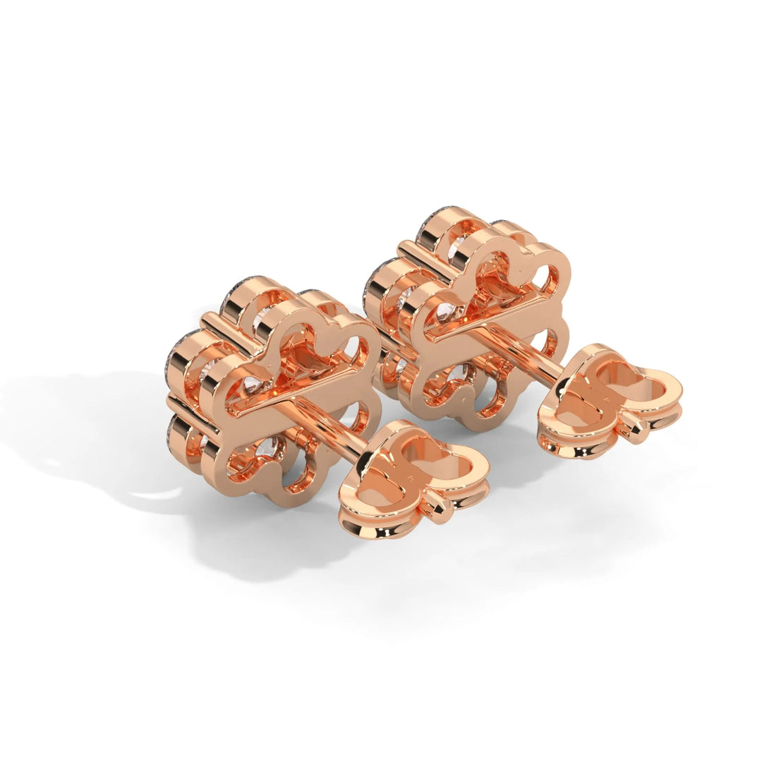 Rose gold puzzle piece cufflinks on a white background.