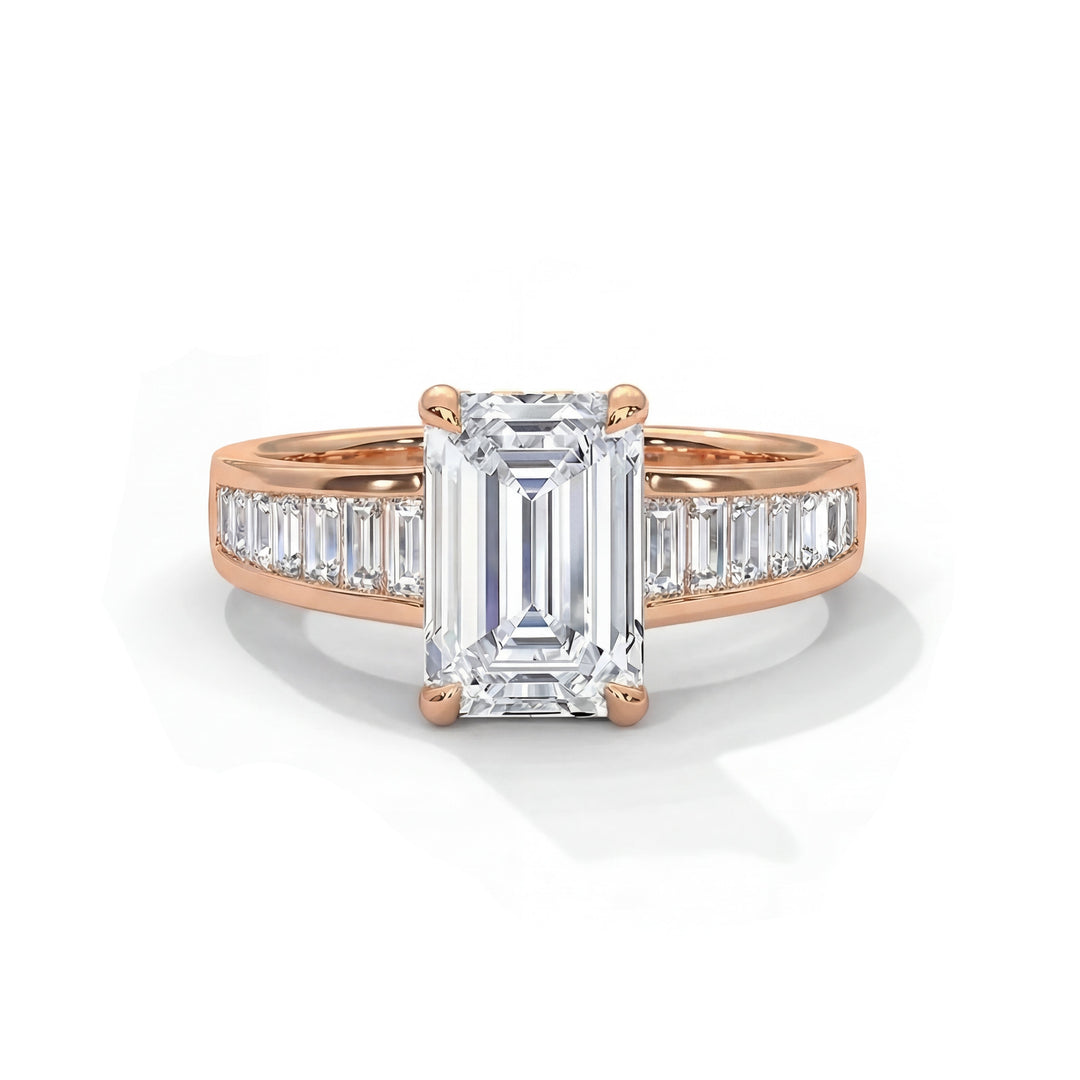 A rose gold ring features a large emerald-cut diamond center stone, flanked by baguette diamonds set into the band. Elegant and luxurious design.
