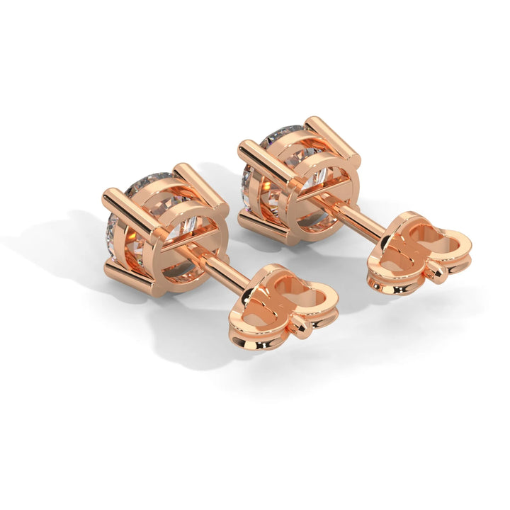 Rose gold stud earrings adorned with sparkling diamonds showcasing elegance and sophistication in a timeless design.