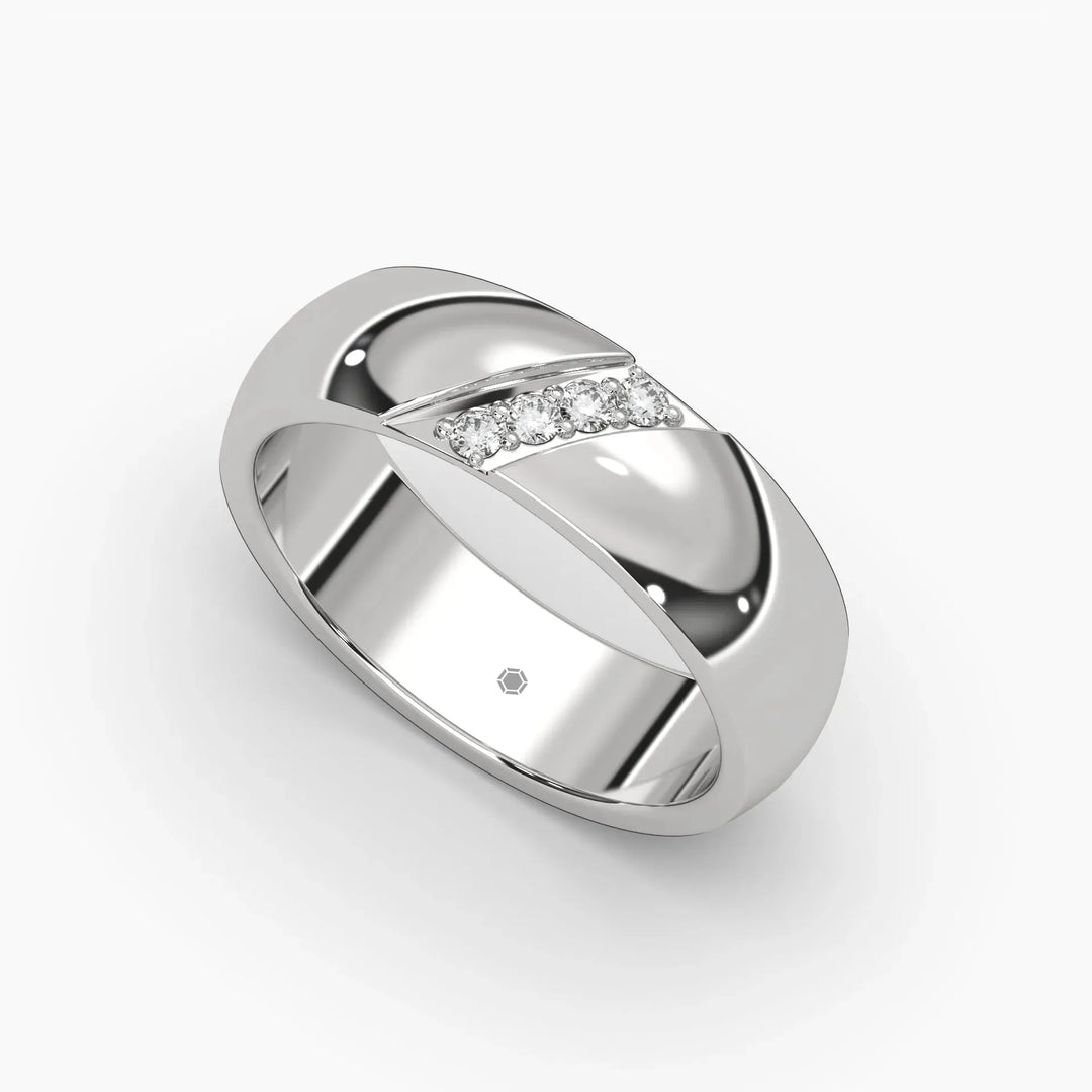 Silver ring with a sleek, modern design, featuring a band of small, sparkling diamonds across its surface. The background is plain white.