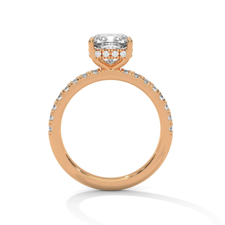 A rose gold engagement ring featuring a stunning cushion diamond center in a Sun Belt setting.