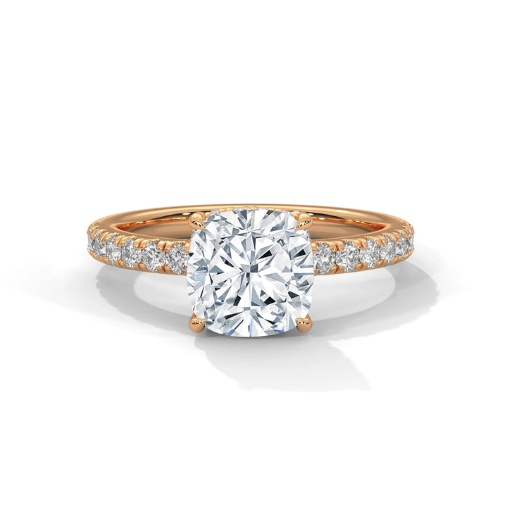 An exquisite cushion 14k diamond engagement ring in rose gold, highlighted by a sophisticated Sun Belt setting for a timeless look.