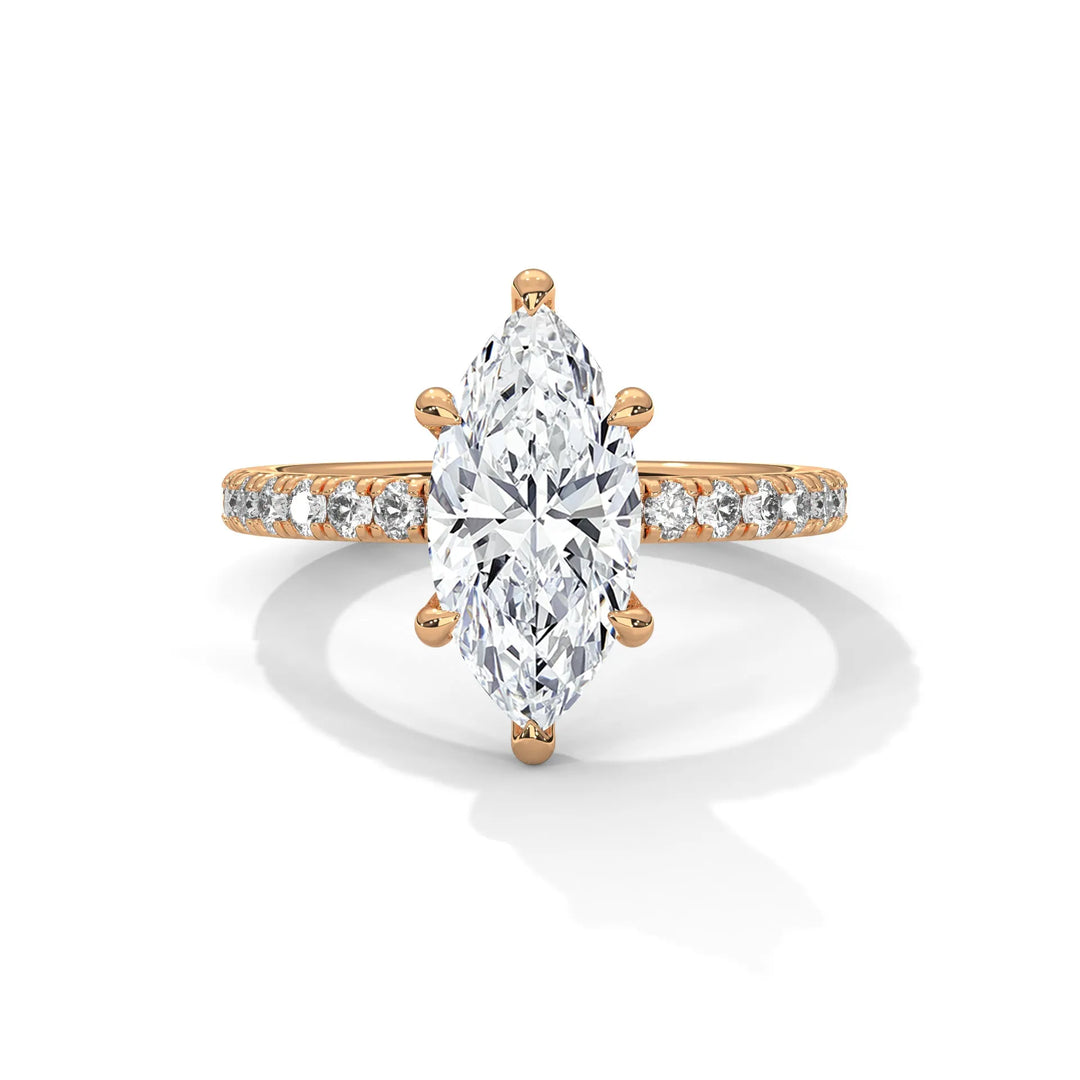 An exquisite marquise 14k diamond engagement ring in rose gold, highlighted by a sophisticated Sun Belt setting for a timeless look.