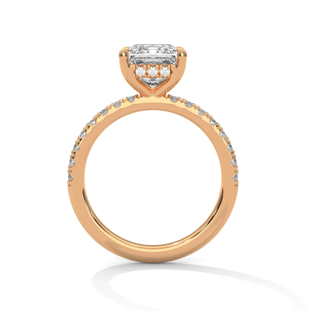 A rose gold engagement ring featuring a stunning princess diamond center in a Sun Belt setting.