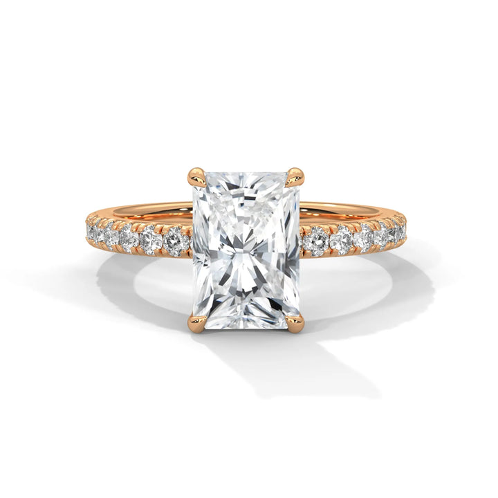 An exquisite radiant 14k diamond engagement ring in rose gold, highlighted by a sophisticated Sun Belt setting for a timeless look.