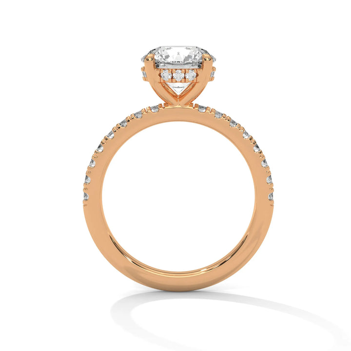 A rose gold engagement ring featuring a stunning round diamond center in a Sun Belt setting.