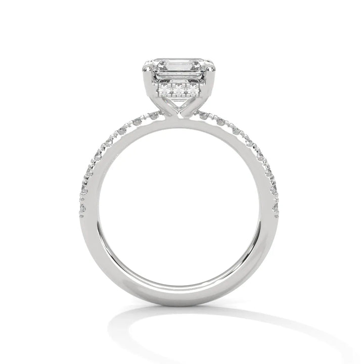 A white gold engagement ring featuring a stunning asscher diamond center in a Sun Belt setting.