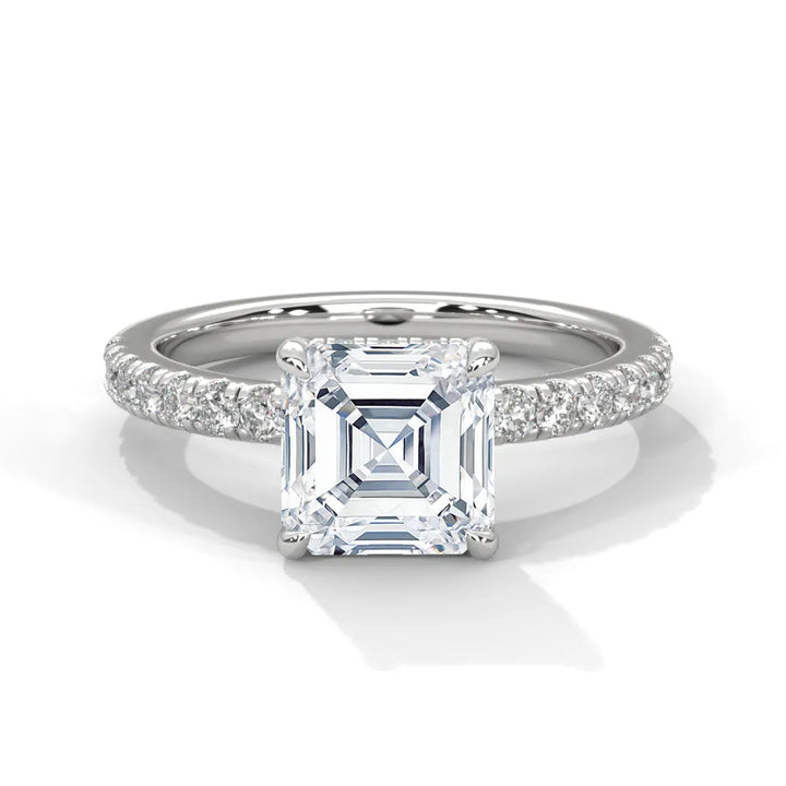 An exquisite asscher 14k diamond engagement ring in white gold, highlighted by a sophisticated Sun Belt setting for a timeless look.